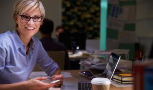business woman working in the office late on marketing campaigns